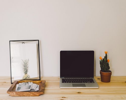 Person working from home with proper ergonomic setup